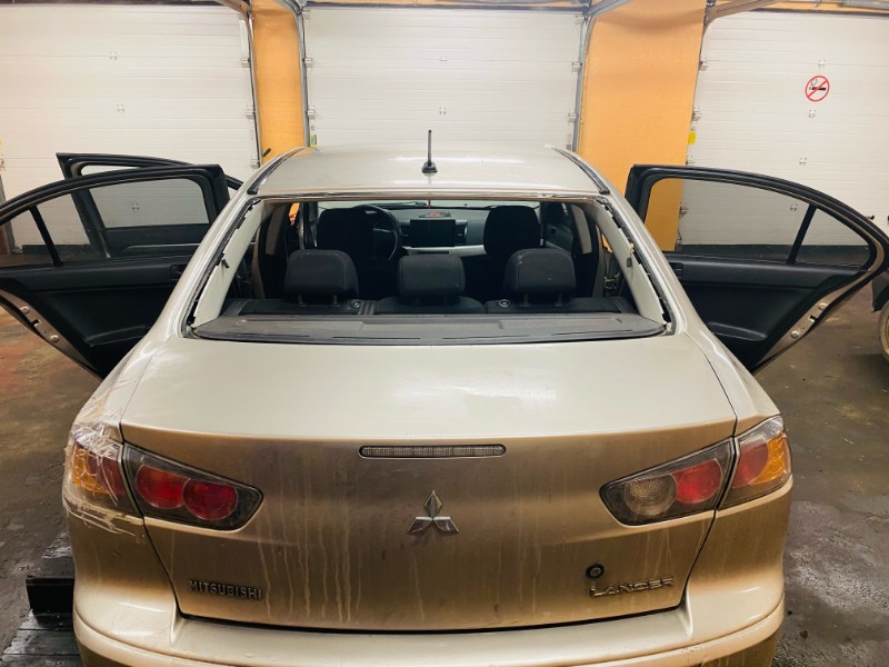 Замена заднего ветрового стекла Mitsubishi Lancer IX
