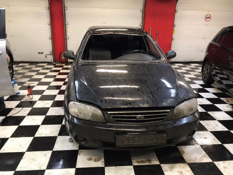 Замена заднего стекла Kia Spectra